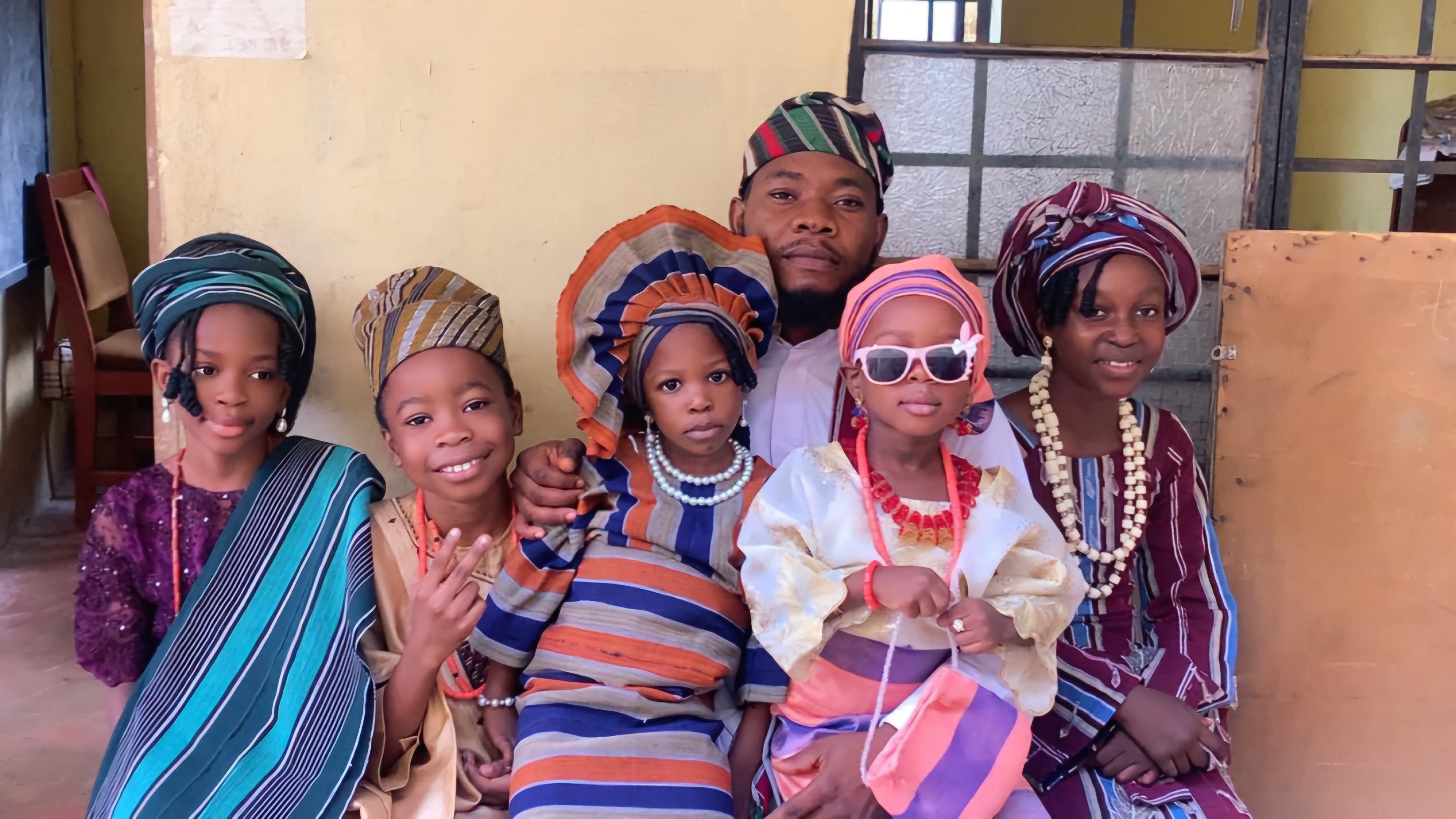 Pupils in traditional attire for a cultural celebration at the school
